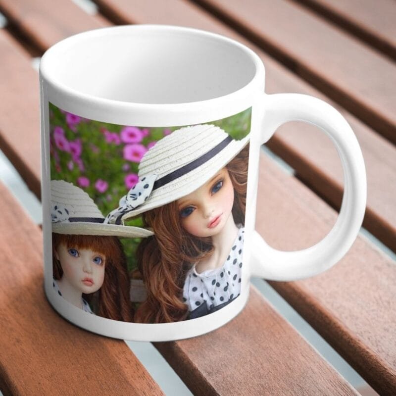 Charming Dolls in Matching Polka Dot Dresses and Hats Enjoy a Sunny Day in the Garden - Image 2