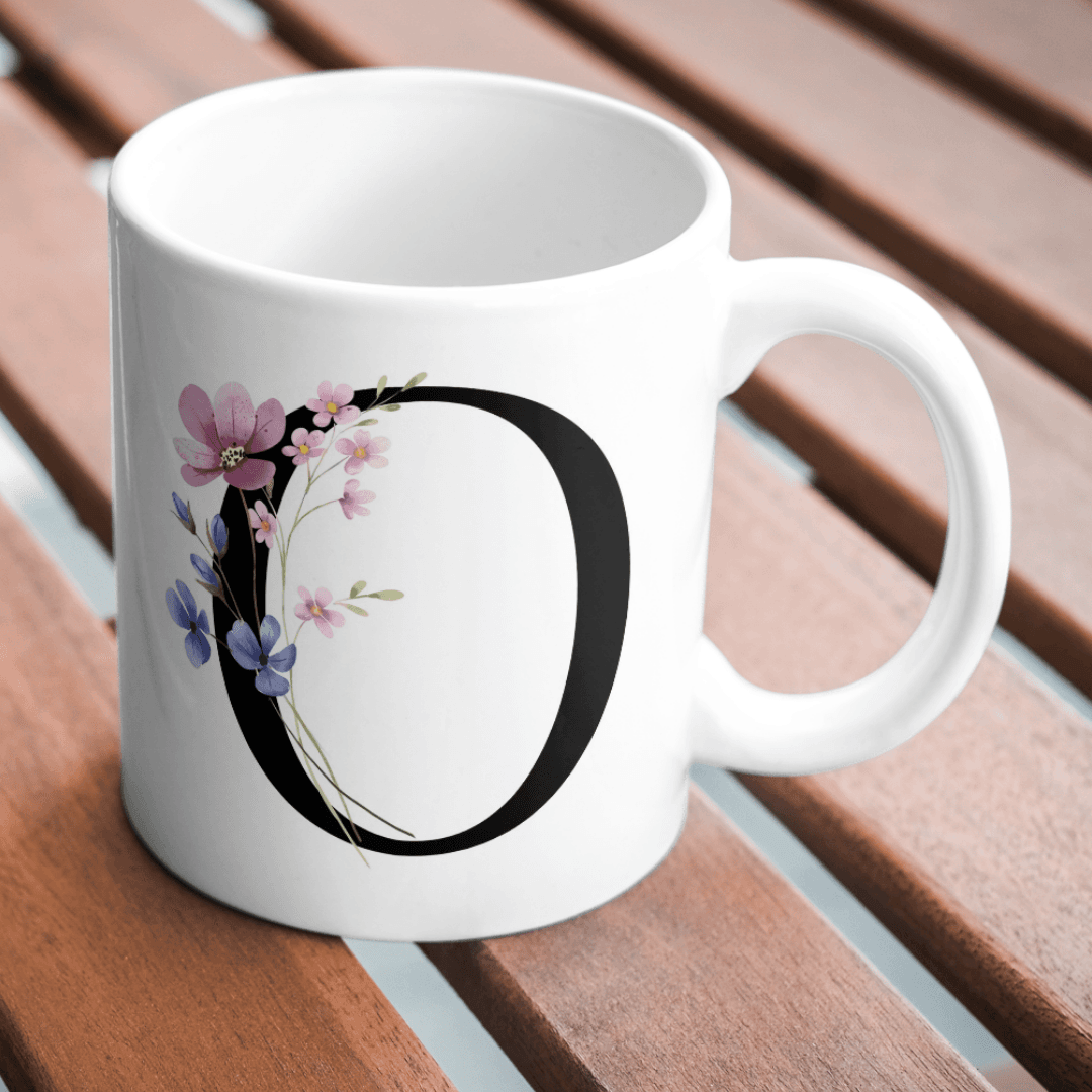 Elegant Floral O Design With Soft Pink And Blue Blooms Mug