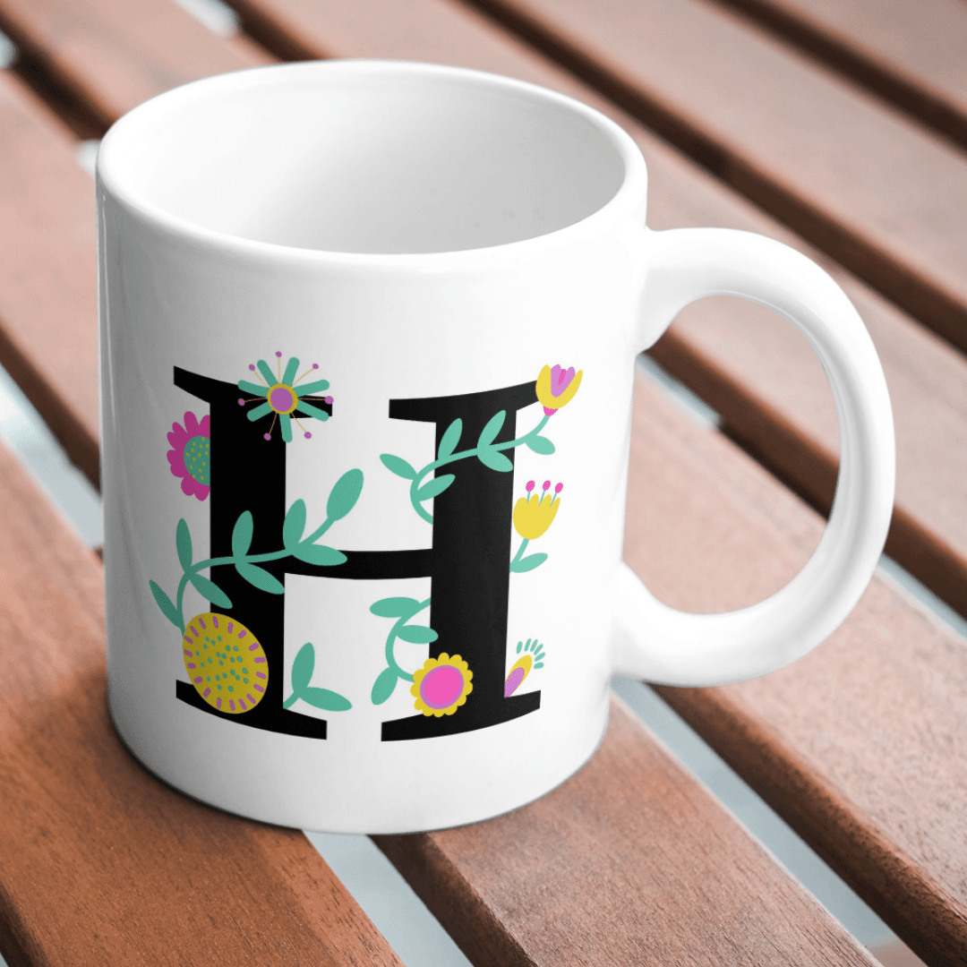 Colorful Floral Vines Decorating a Bold Stylish Letter H Mug